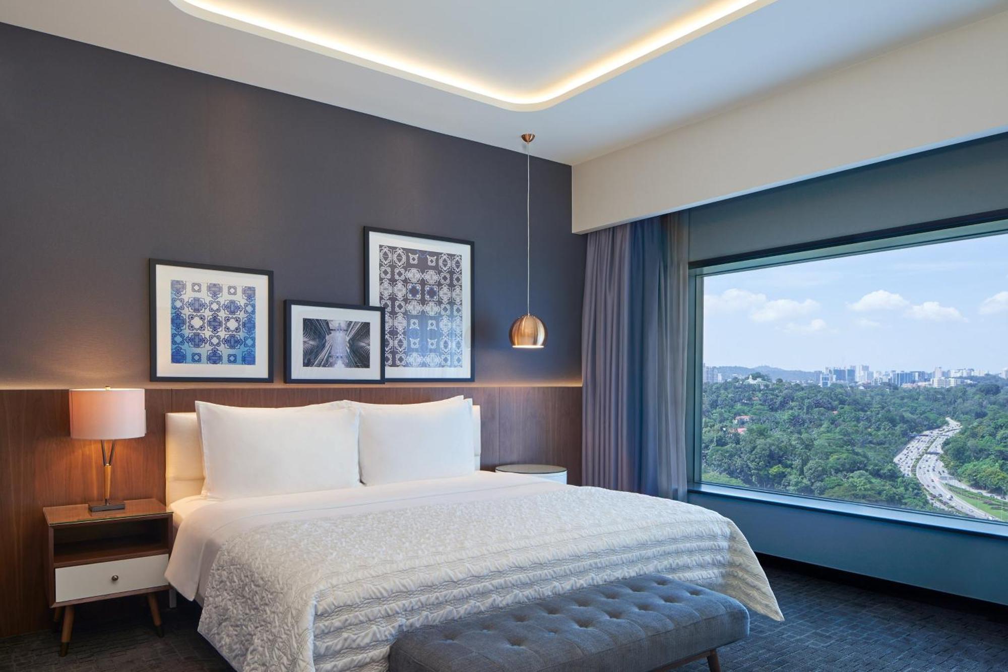 Le Meridien Kuala Lumpur Kültér fotó A bedroom at the hotel